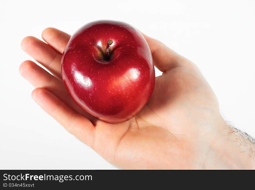 Hand with apple