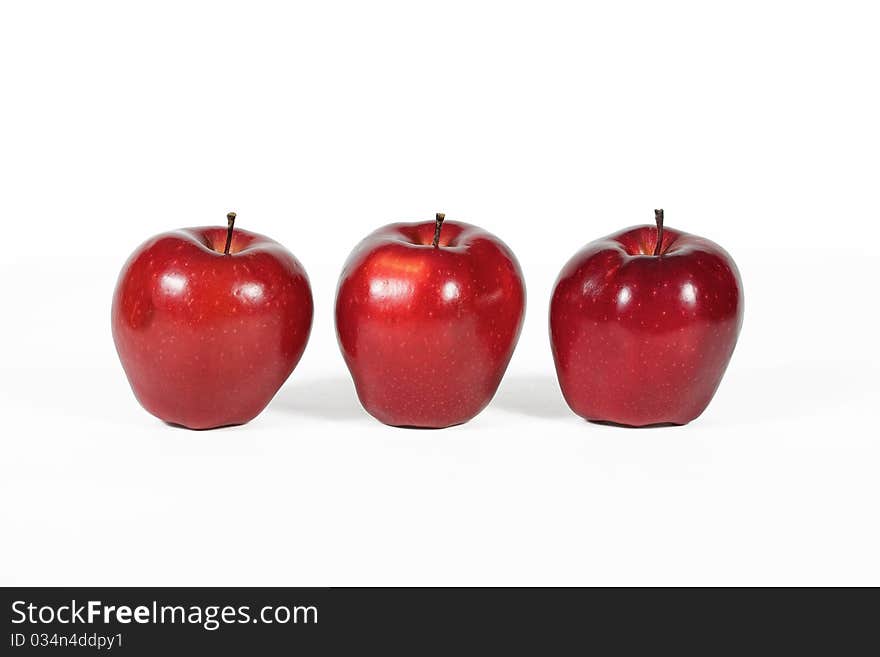 Three red apples