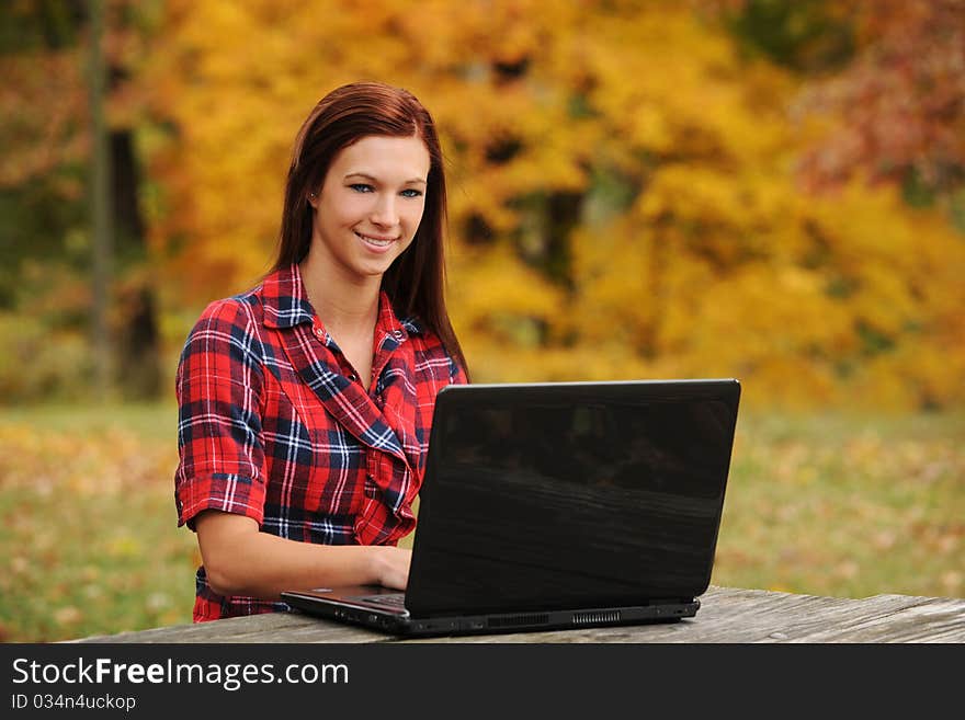 Young Woman With Laptop Computer