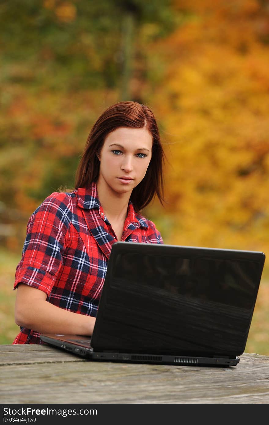 Young Woman with laptop computer