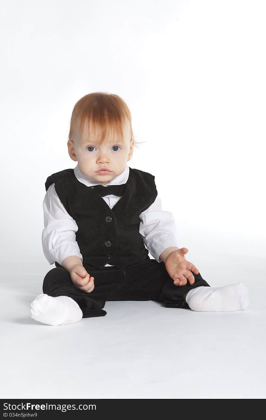 Funny boy in suit with bow