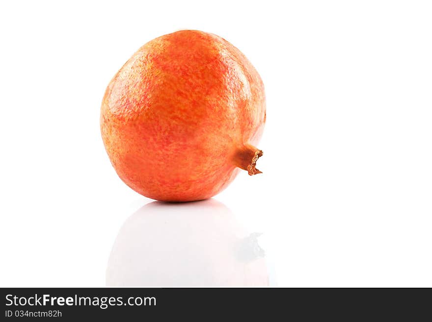 Pomegranate isolated white with reflection