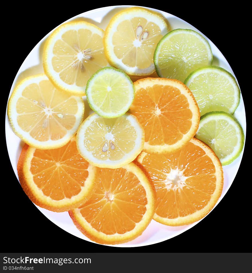 Plate of sliced citrus fruits. Plate of sliced citrus fruits