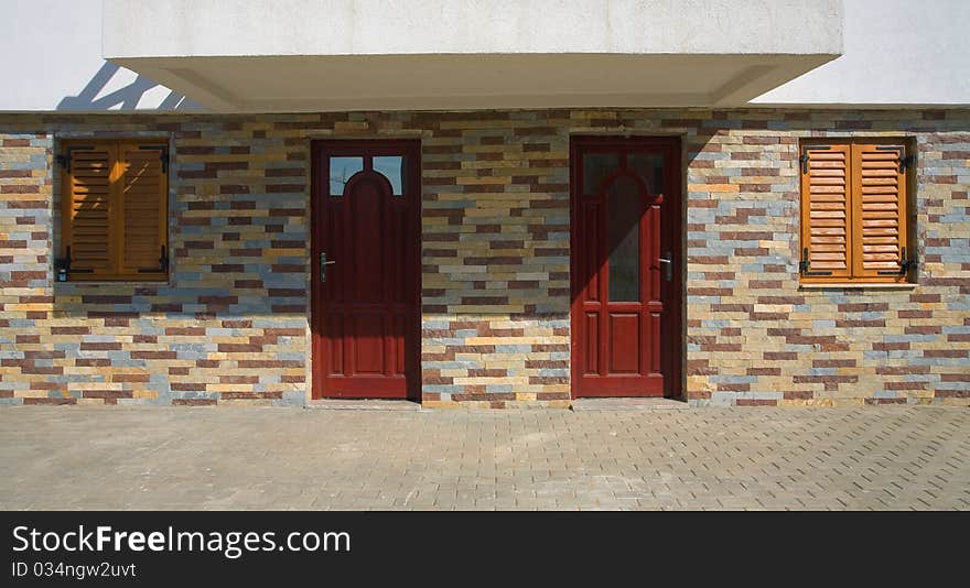 Entrances and a facade of a new house. Entrances and a facade of a new house.