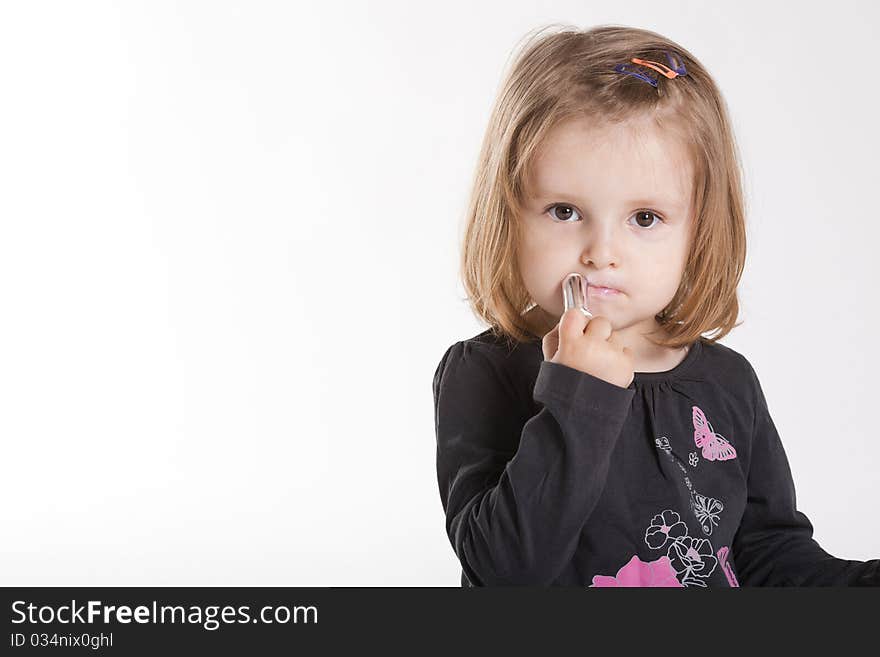 Little funny girl with lipstick. Little funny girl with lipstick