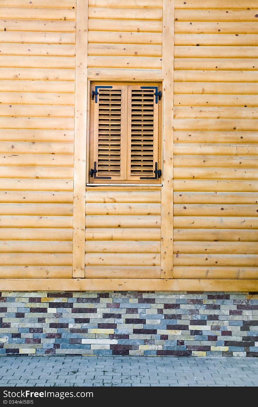 Facade of a new wooden house. Facade of a new wooden house.