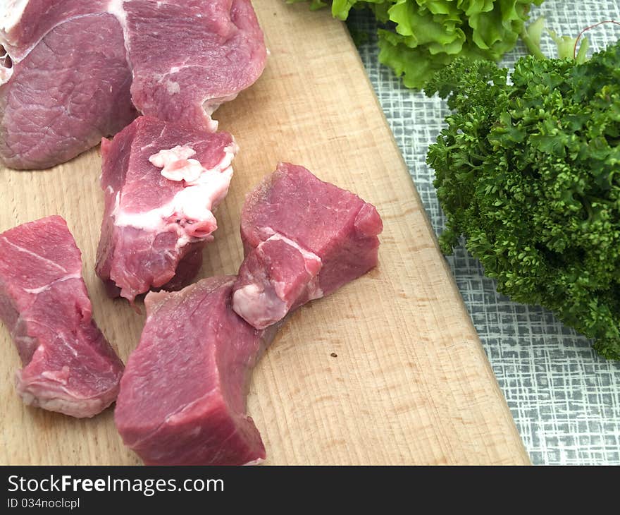 Meat on a kitchen board