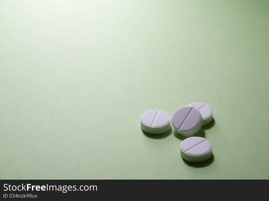 Four Medical Pills, Isolated On Green