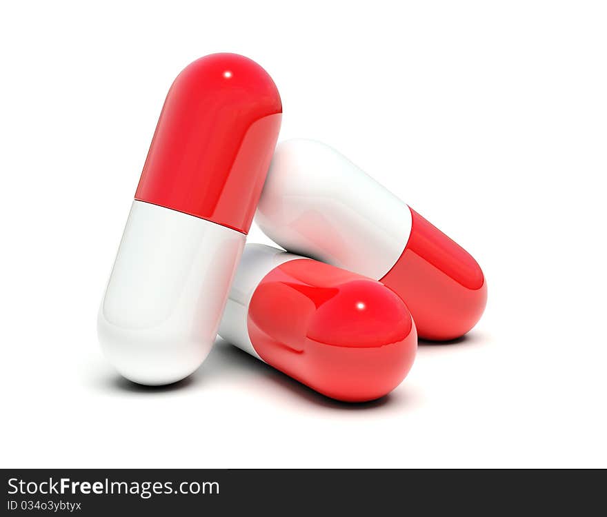 Isolated three pills on a white background, three red