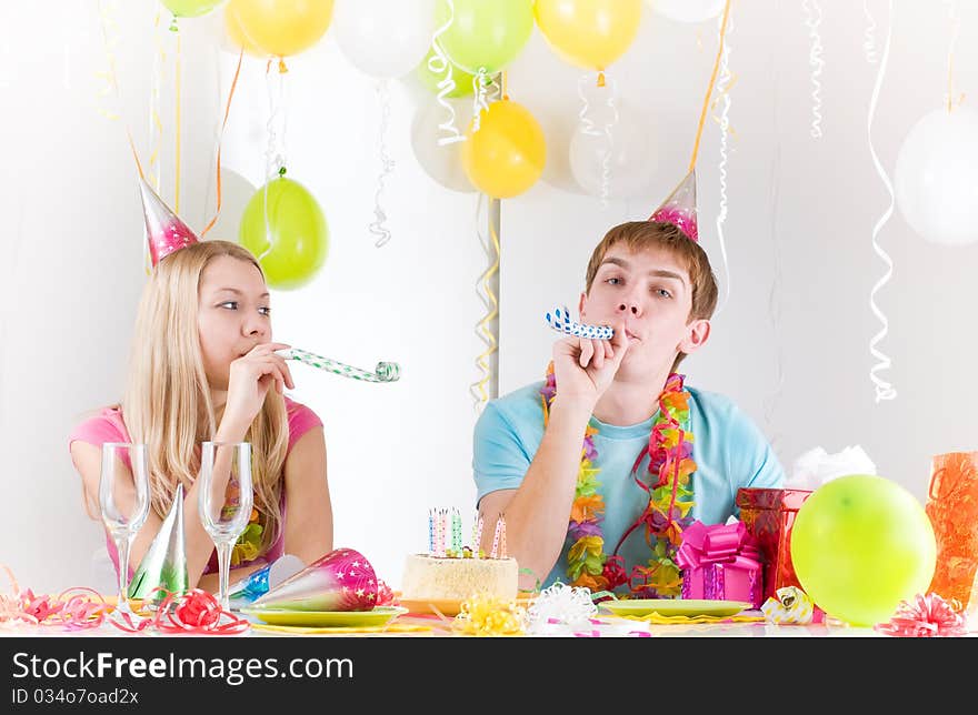 Young happy smiling couples at birthday. Young happy smiling couples at birthday