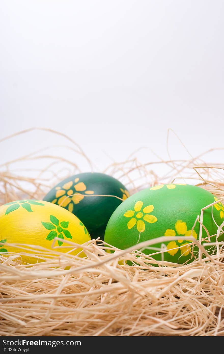 Colorful hand-painted Easter eggs on a wooden table. Colorful hand-painted Easter eggs on a wooden table.