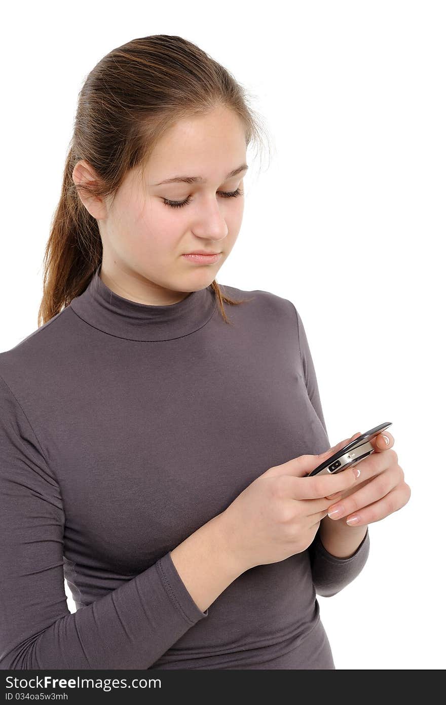 Girl using a mobile phone  On a white background