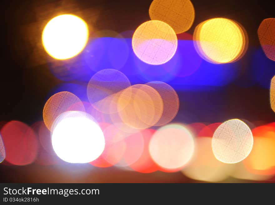 Defocused lights facula background at night. Defocused lights facula background at night