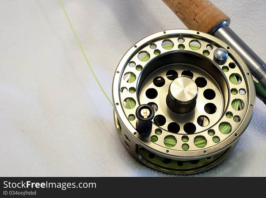 Close up of a fly fishing reel.