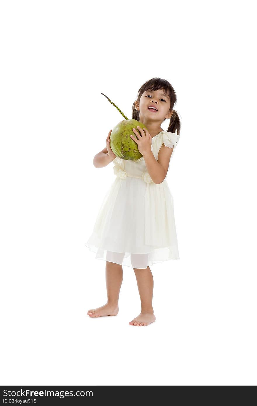 Sweet little girl with coconut, isolated on white background