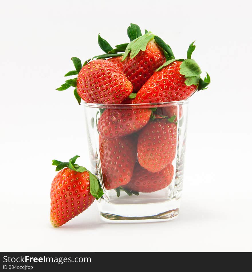 Strawberry and glass - isolated over white space