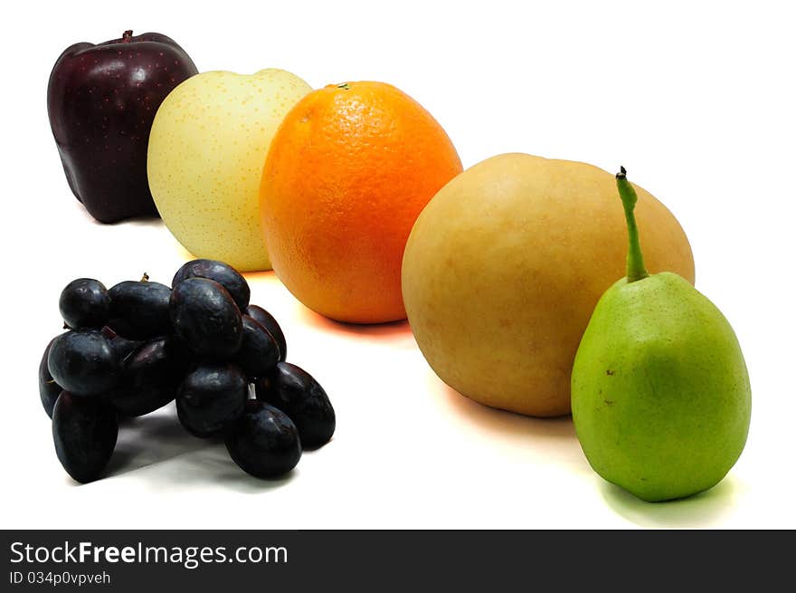 Tropical fruits against white background. Tropical fruits against white background