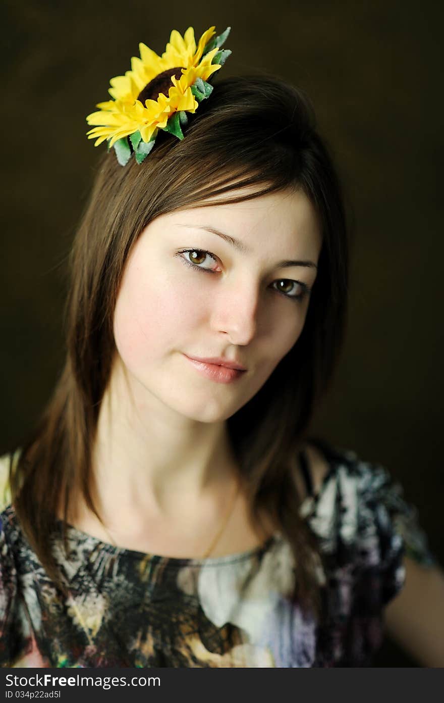 Beautiful woman with sunflower