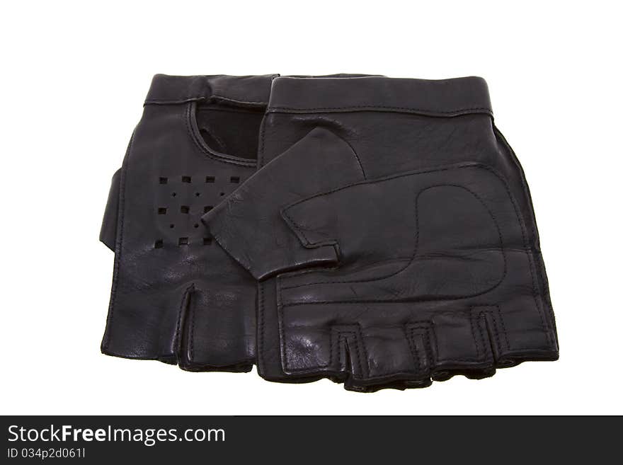 The isolated leather black gloves with the cut off fingers. The isolated leather black gloves with the cut off fingers