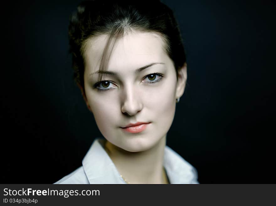 An image of a portrait of a beautiful young girl