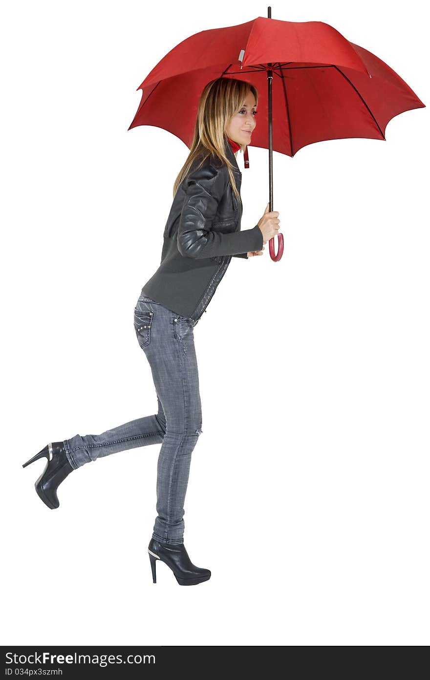 Happy smiling woman under her red umbrella. Happy smiling woman under her red umbrella