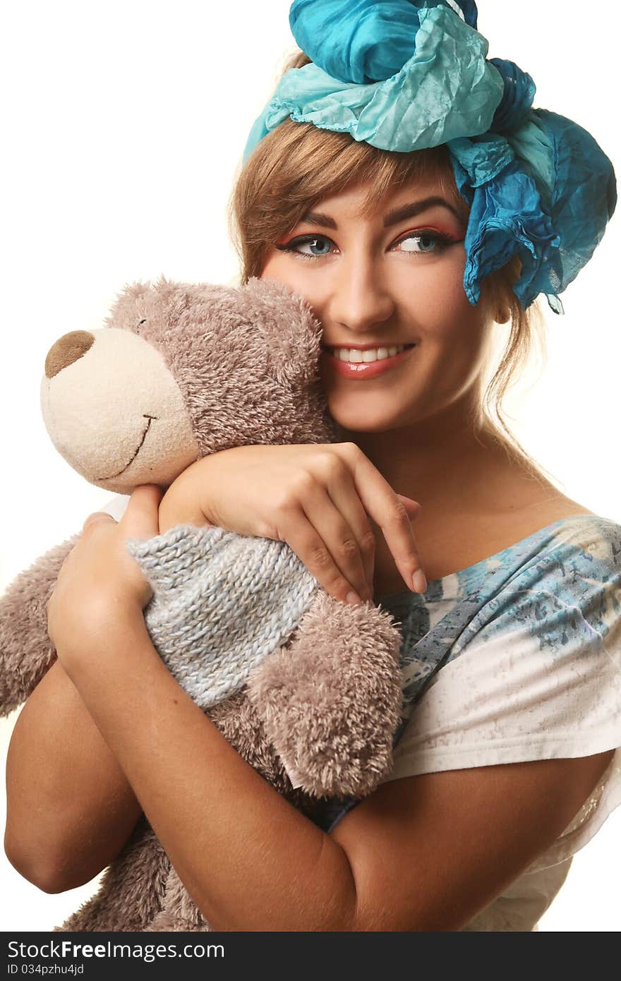 Blue-eyed beauty with bear. Blue-eyed beauty with bear