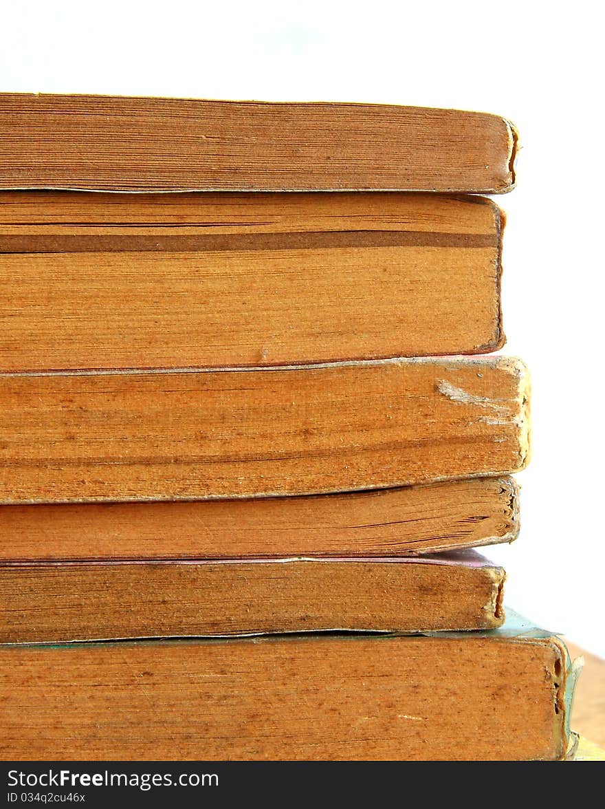 Edged of stack old books in isolated