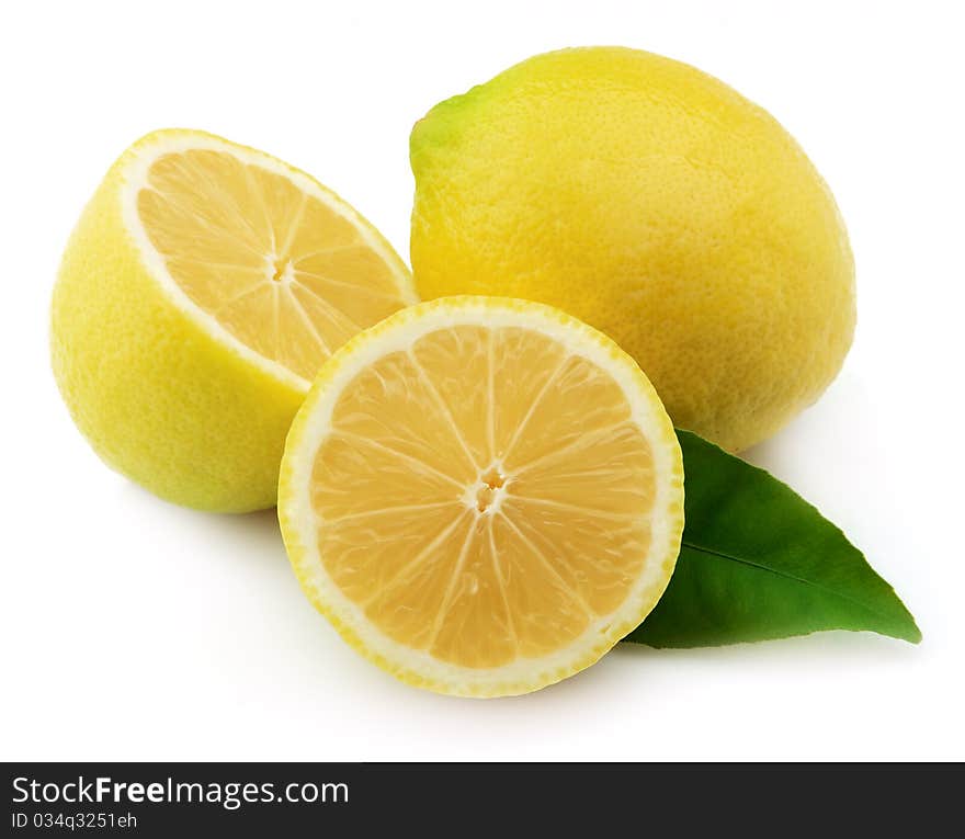 Lemon with leaves on a white background