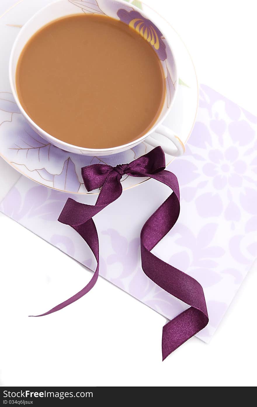 Cup of cappuccino blank note and violet ribbon. Cup of cappuccino blank note and violet ribbon