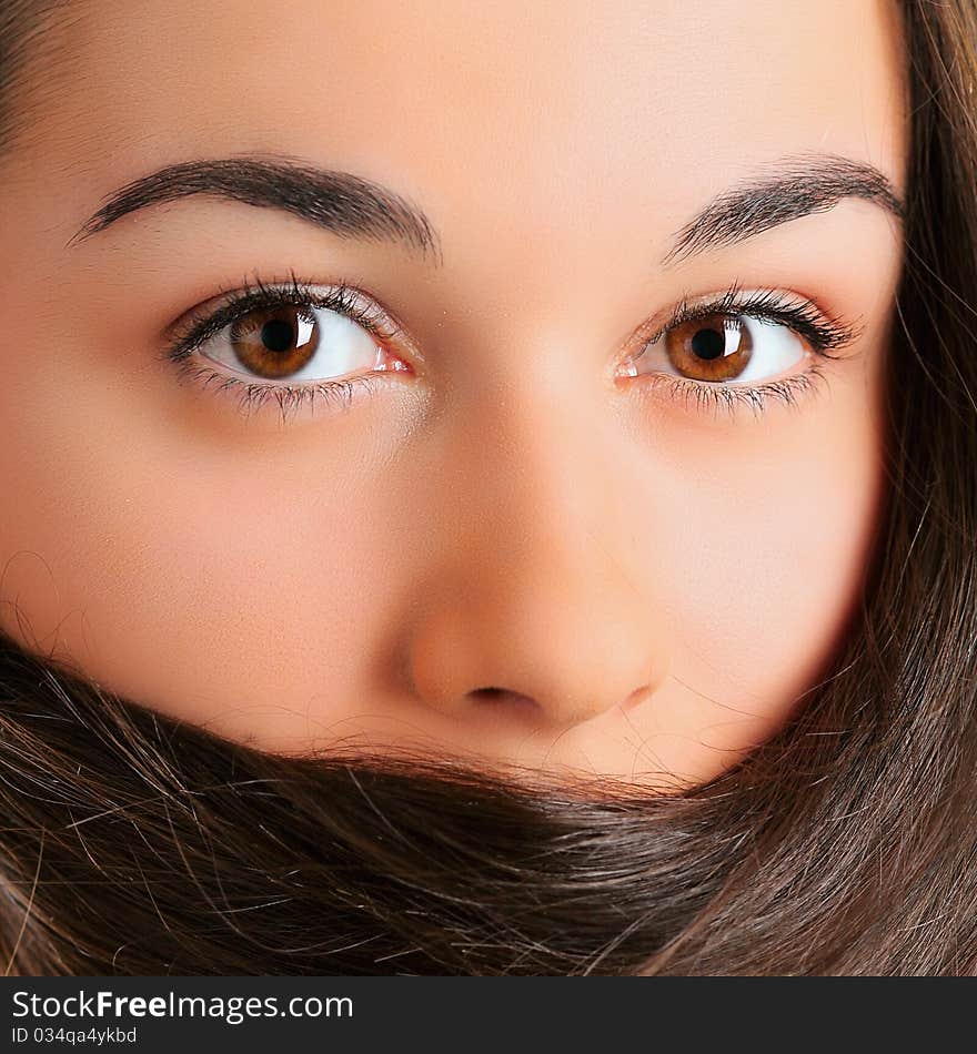 Beautiful young woman with long hair