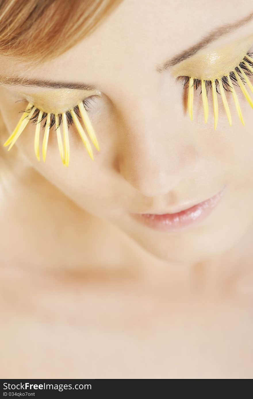 Woman wearing petal eyelashes