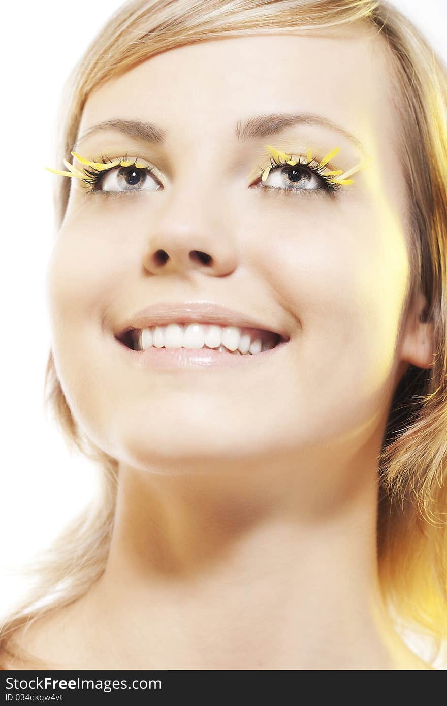 Woman wearing petal eyelashes