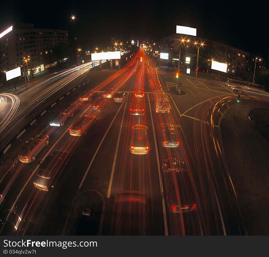 Motion blur of car lights on street at night with blank billboards ready for your advertisement. Please see some similar images in my portfolio. Motion blur of car lights on street at night with blank billboards ready for your advertisement. Please see some similar images in my portfolio.