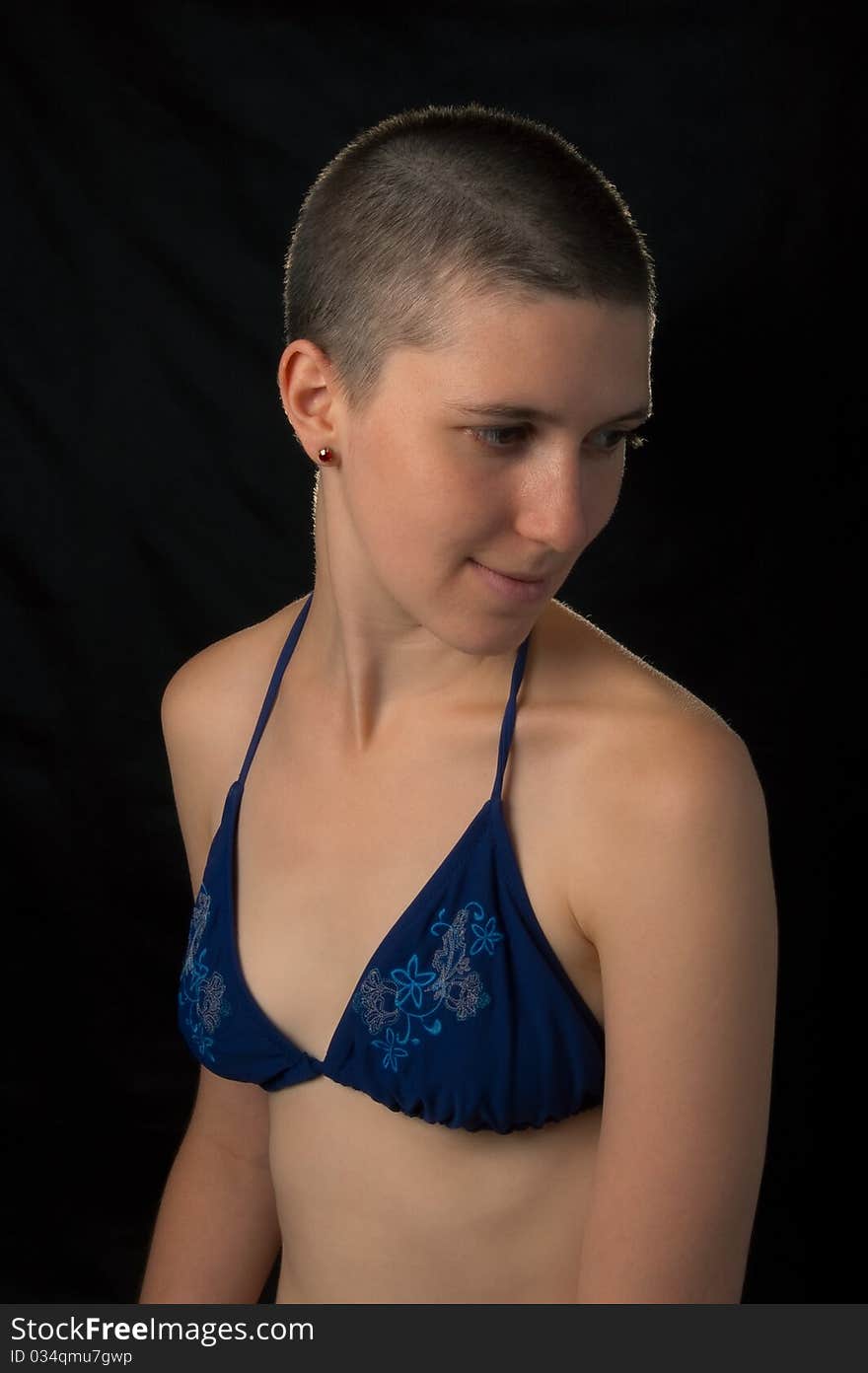 Shaved girl in bikini