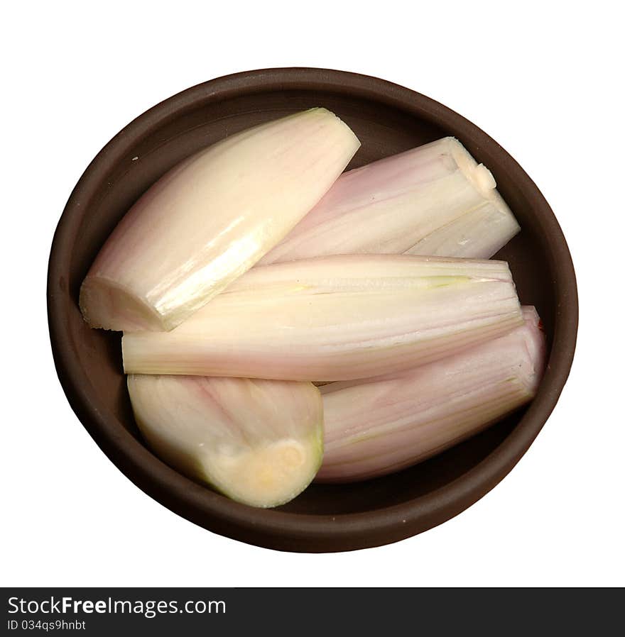 Sliced onions dish on white background