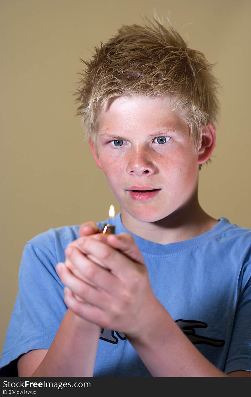 Boy playing with fire