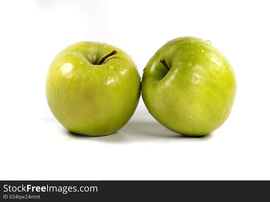 Two fresh green apple on white background