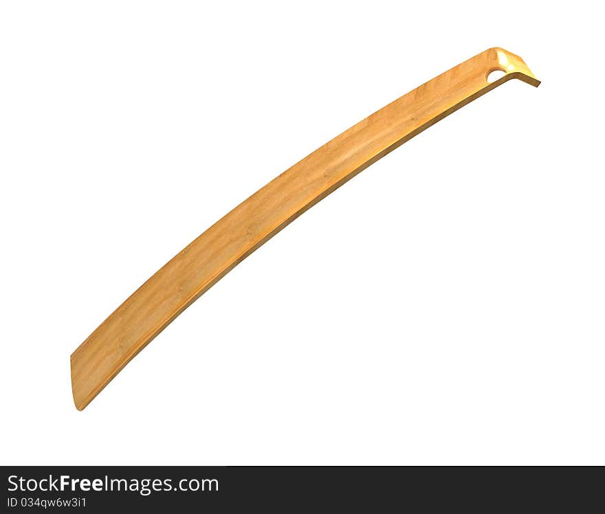 The wooden spoon for footwear on a white background. The wooden spoon for footwear on a white background