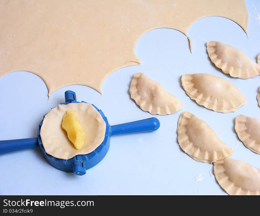 Homemade dumplings on blue table