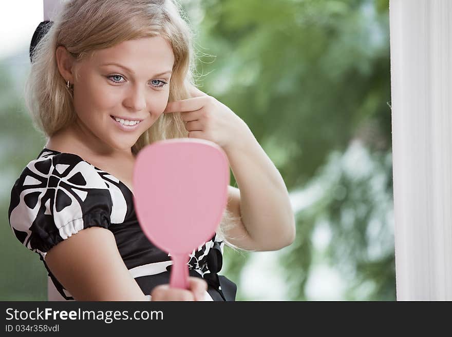 Portrait of young nice woman with dress on color back. Portrait of young nice woman with dress on color back