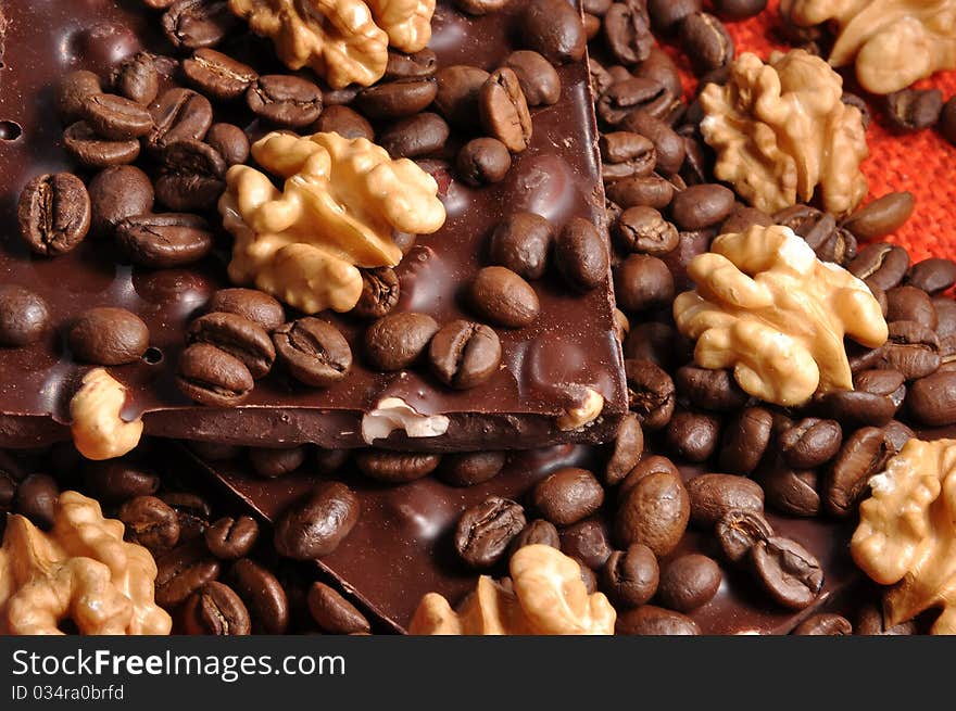 Black chocolate with coffee beans and nuts