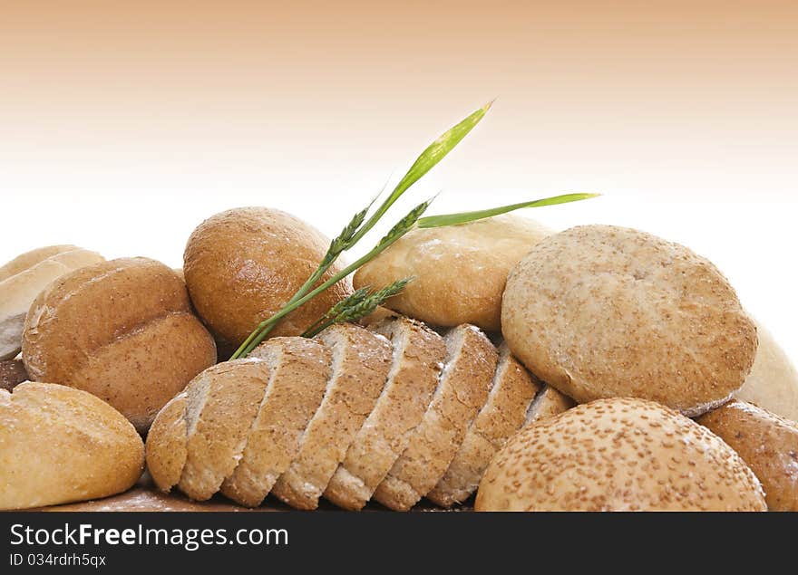 Fresh bread with wheat stem sprinkle with flour. Fresh bread with wheat stem sprinkle with flour