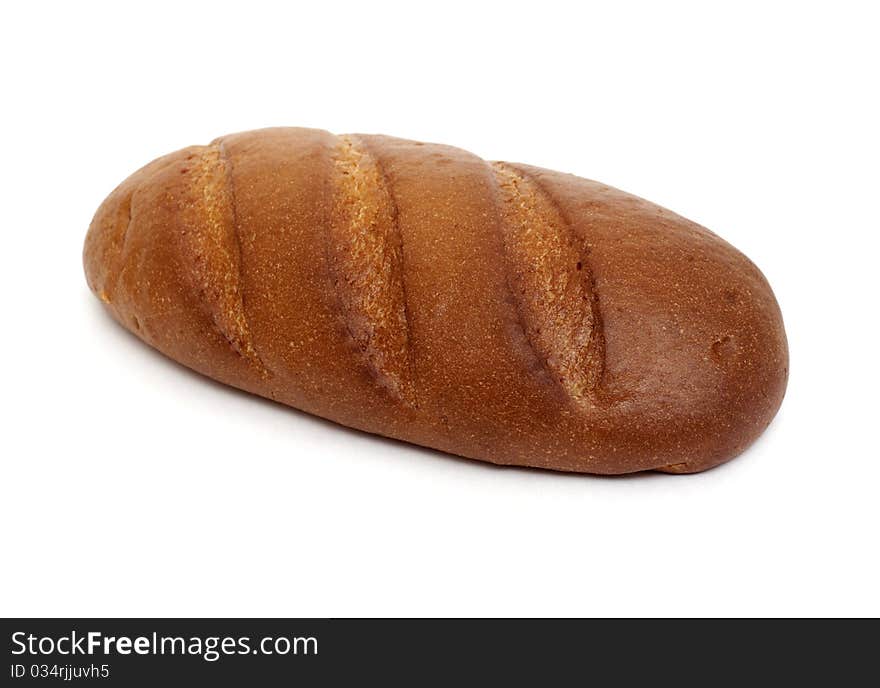 Fresh-baked long loaf on a white background