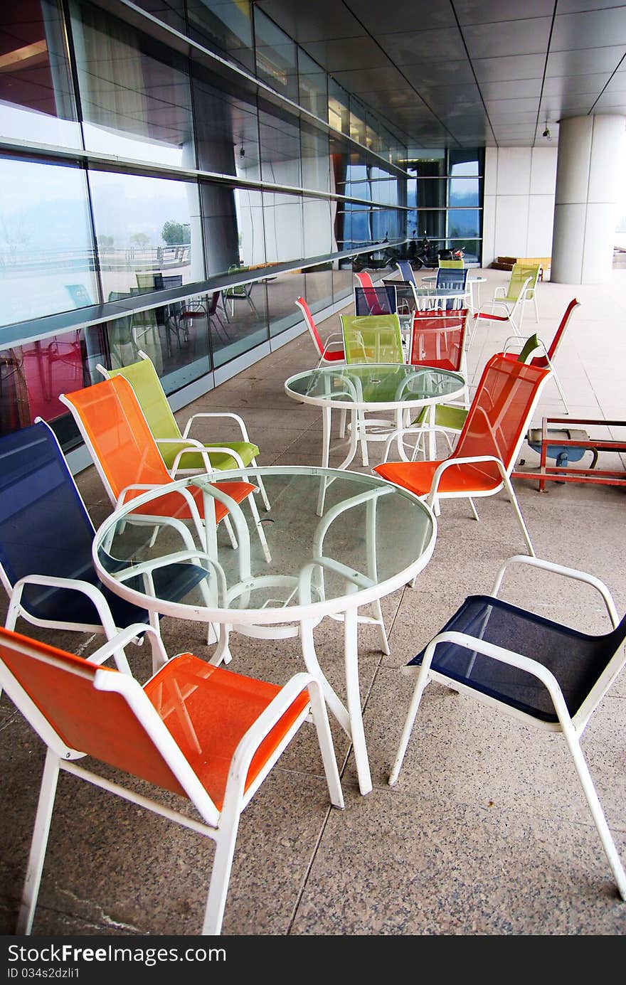 Colorful tables and chairs in a building