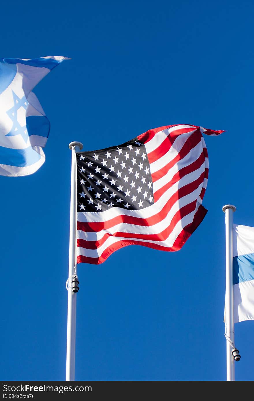 American flag on blue sky