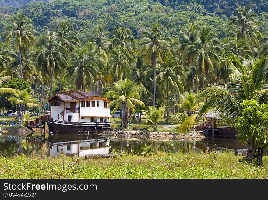 The hotel is in the tropics . Thailand .