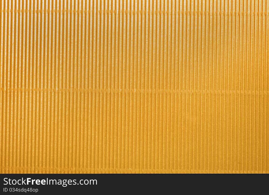 Yellow corrugated cardboard placed horizontally