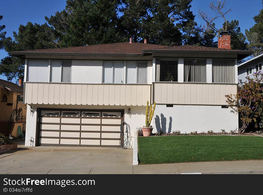 House surrounded by trees and grass