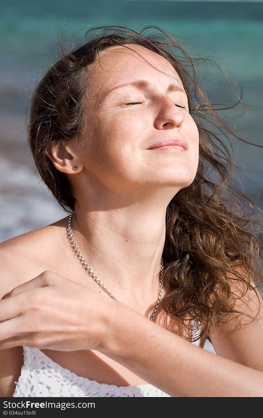 A woman enjoying sunbath