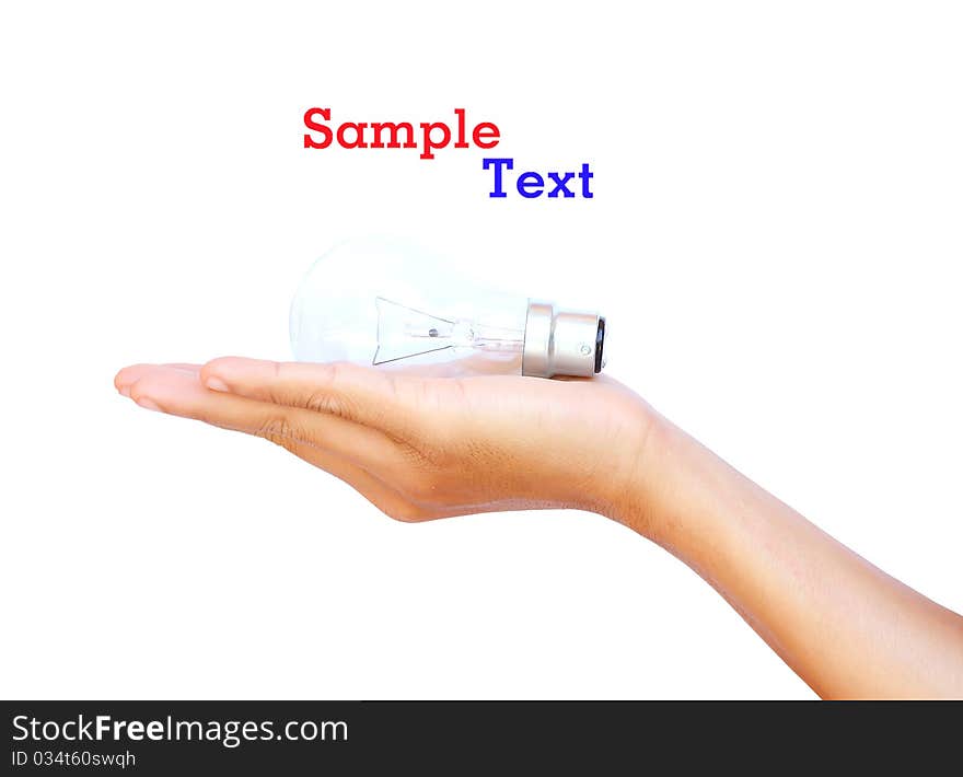 Hand holds incandescent lamp on white background. Hand holds incandescent lamp on white background